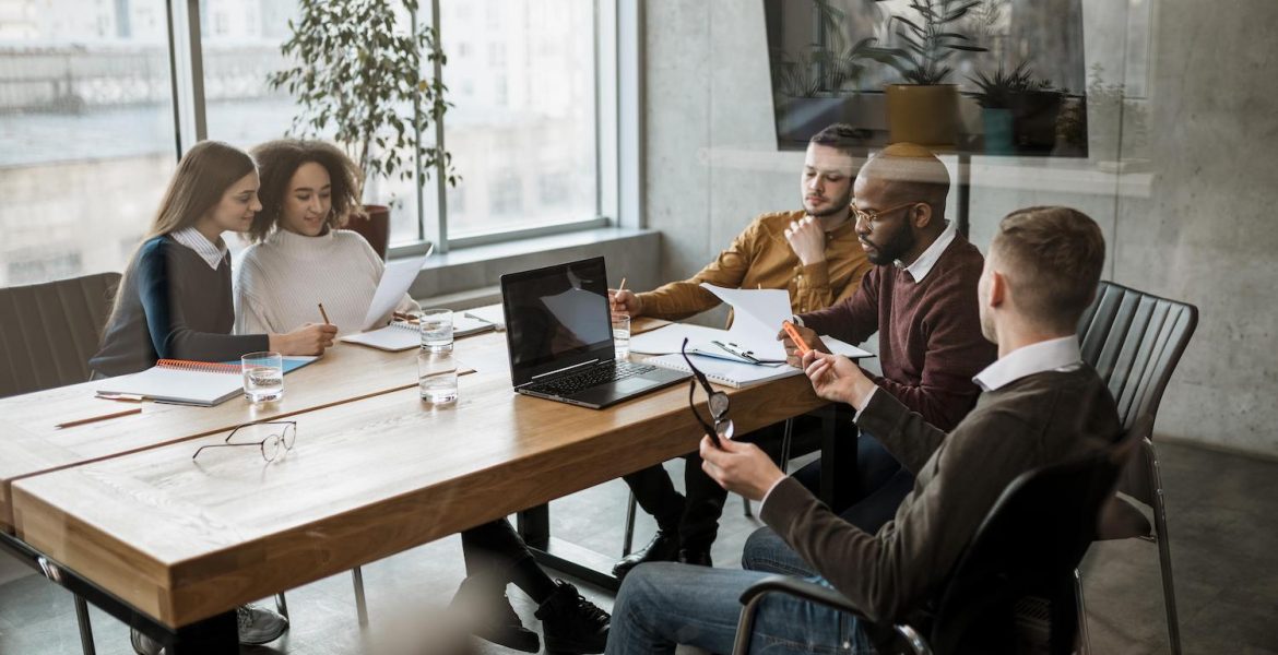 front-view-people-having-meeting-office